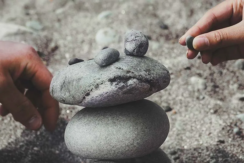 Work-life balance metaphor with rocks