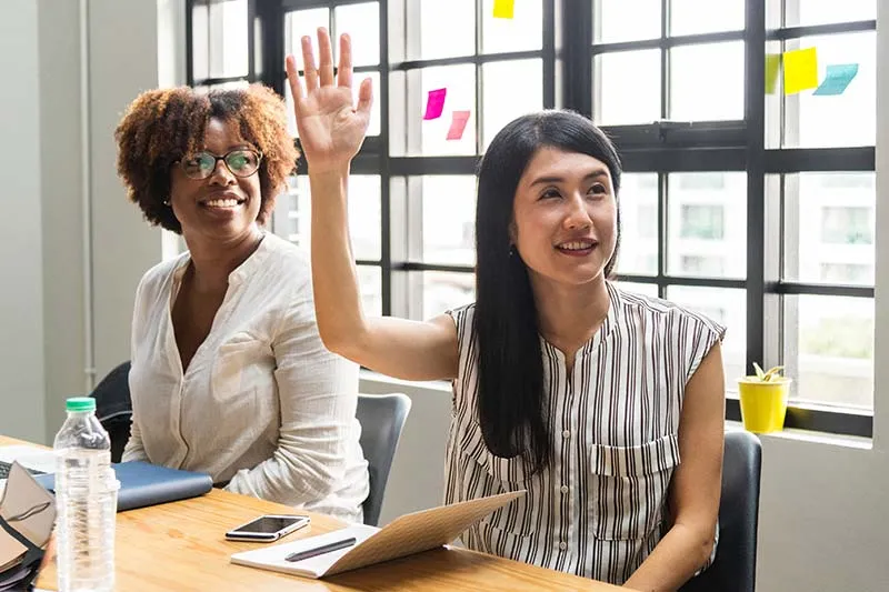 two women in a business meeting