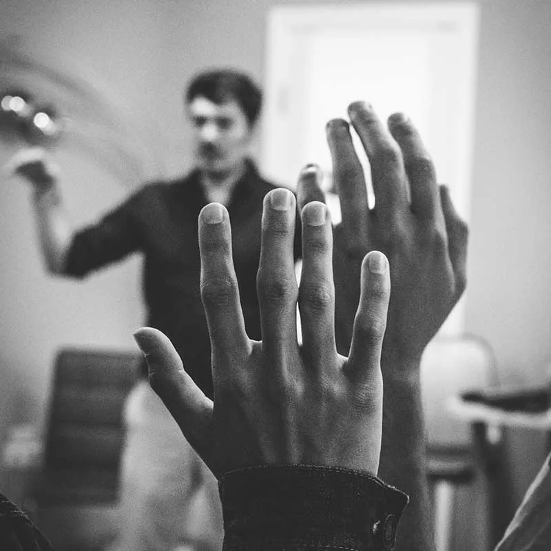 a man looking at his hand using VR