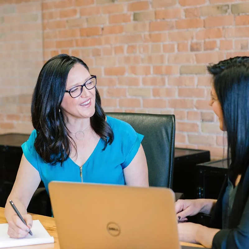 customer meeting between two women