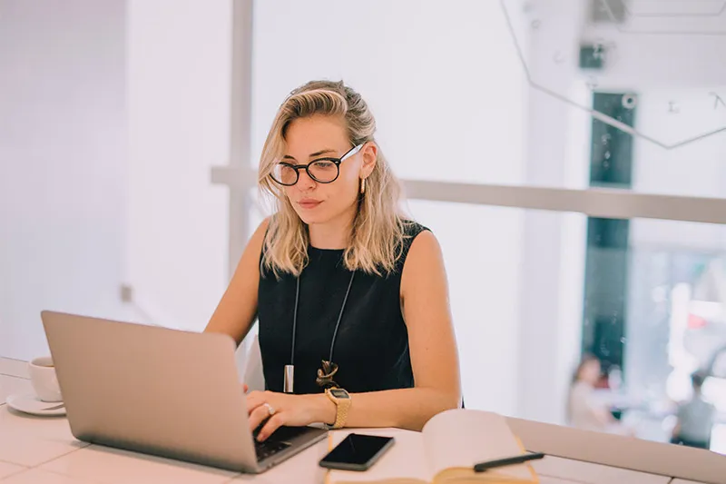 woman working on her laptop 