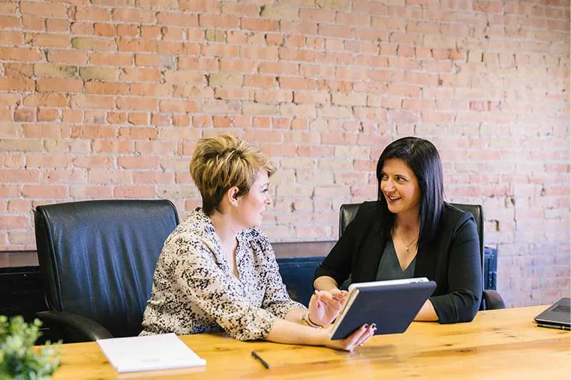 two women in a customer advocacy program