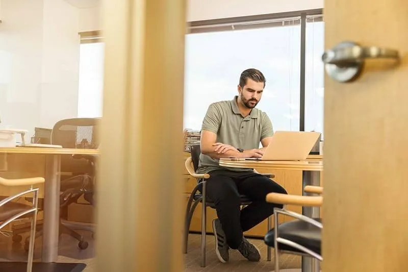 a man working on a laptop