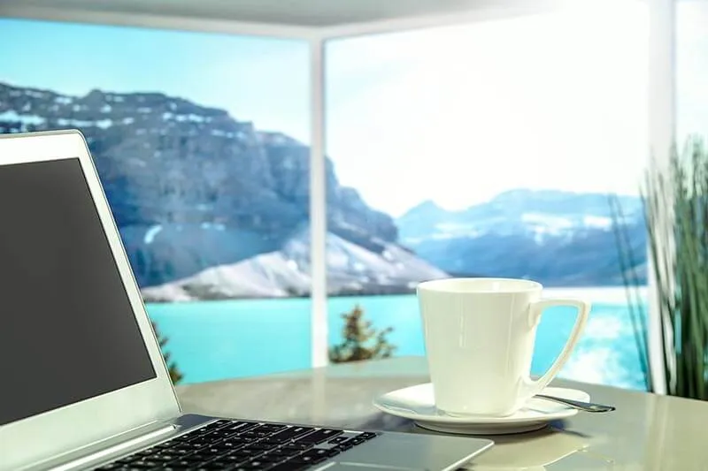 macbook and a cup of coffee