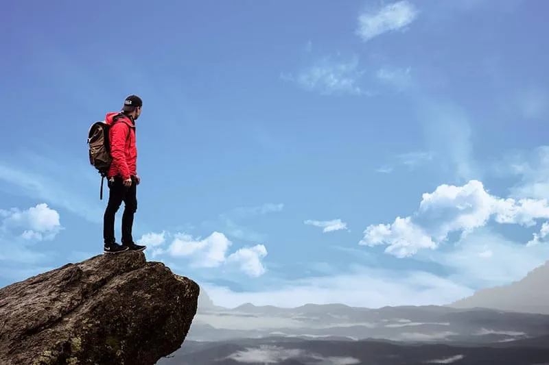 a man standing on a rock