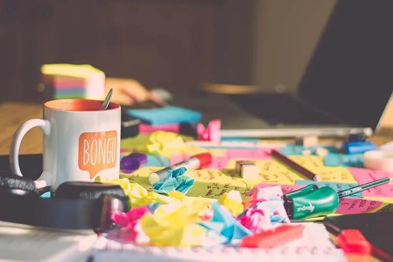 a mug and candies as a gift for happy SaaS customers