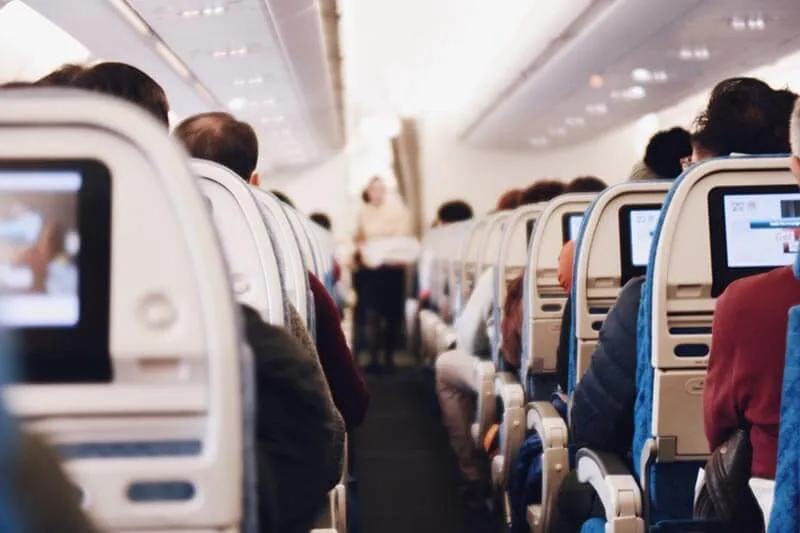 people sitting inside an airplane