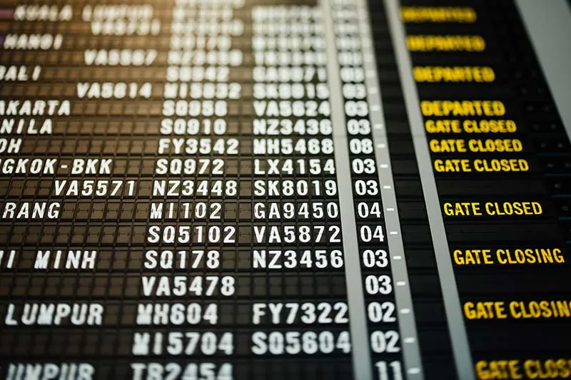 arrival and departure lookup board at the airport