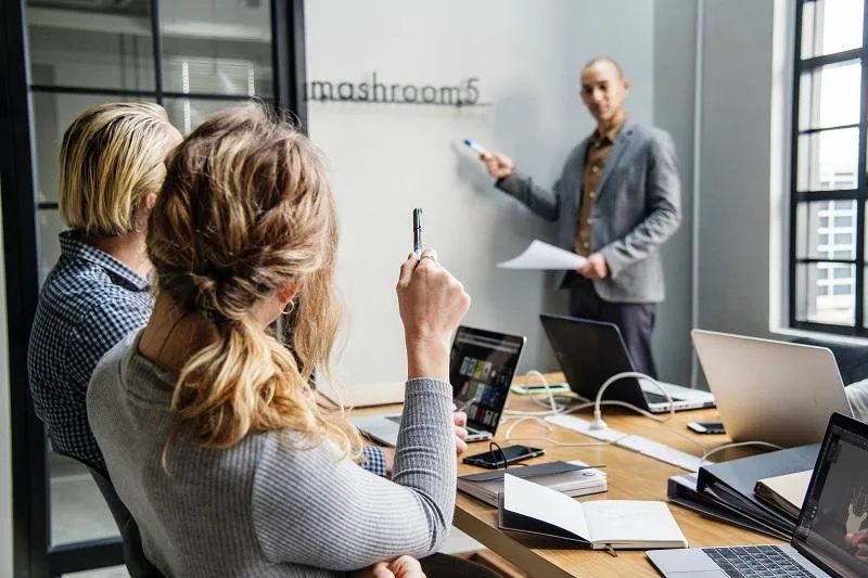 Business presentation on whiteboard