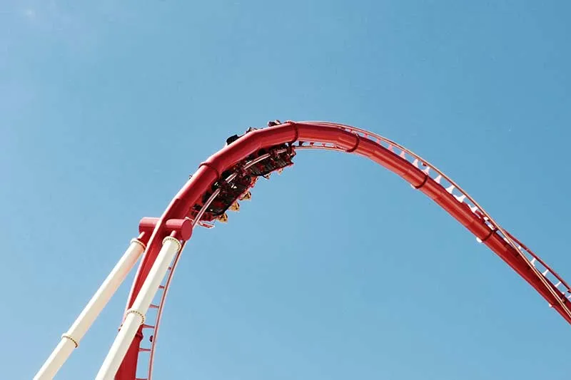 a roller coaster car traveling upside down