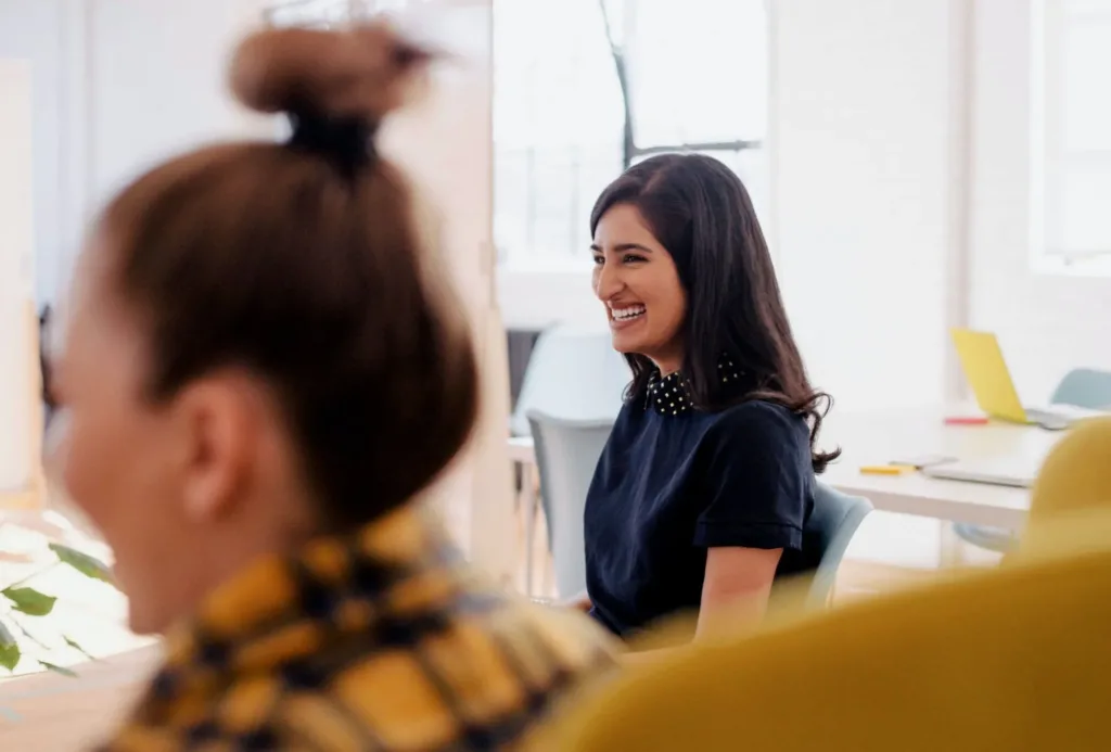 Happy employees in office